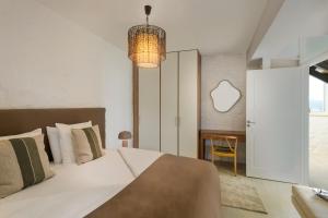 Postel nebo postele na pokoji v ubytování Villa Anton by Cura Villas Collection