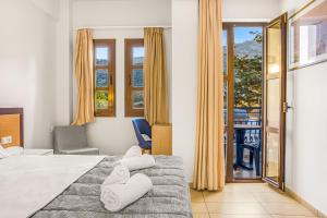 Postel nebo postele na pokoji v ubytování Paradise Hotel-Apartments