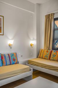 Postel nebo postele na pokoji v ubytování Paradise Hotel-Apartments