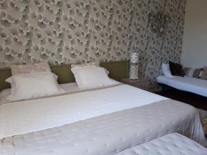 Postel nebo postele na pokoji v ubytování Chambre d'Hôtes de L'Abricotier