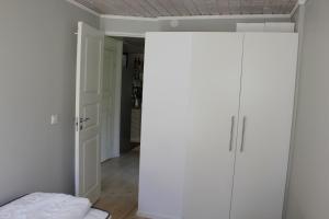 Postel nebo postele na pokoji v ubytování Tofta Beach