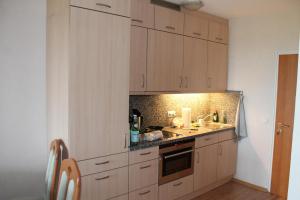 Kuchyň nebo kuchyňský kout v ubytování Ostseeferienwohnung K1317 mit Meerblick + 6 fotografií