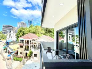 a balcony with a view of a city at SKY City View Apartments Sihanoukville in Sihanoukville