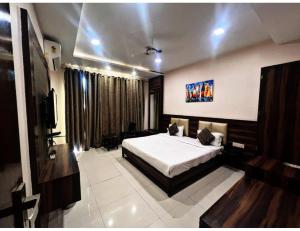 Krevet ili kreveti u jedinici u objektu Hotel Rajmohan Palace,Gwalior