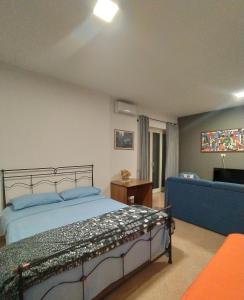 Postel nebo postele na pokoji v ubytování Appartamento Fotia