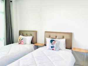 Sky View Home and Hostel Chiangmai客房内的一张或多张床位