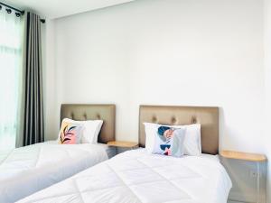 Sky View Home and Hostel Chiangmai客房内的一张或多张床位