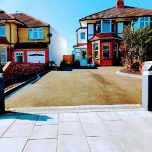 a large house with a driveway in front of it at Beautiful self-contained annex in Hoylake