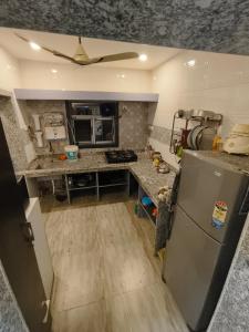 an overhead view of a kitchen with a refrigerator at Palmquist Villa in Neral