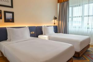 Hampton By Hilton Sakarya客房内的一张或多张床位