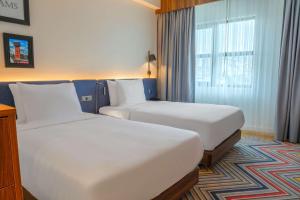 Hampton By Hilton Sakarya客房内的一张或多张床位