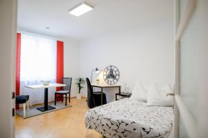 Postel nebo postele na pokoji v ubytování zimmer-graz + 35 fotografií
