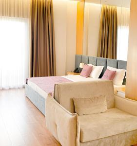 Postel nebo postele na pokoji v ubytování Amfora Hotel & Spa