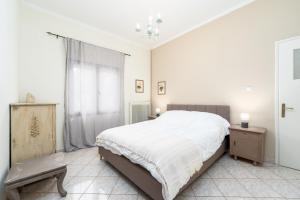 Ένα ή περισσότερα κρεβάτια σε δωμάτιο στο Clepsydra Mountain House