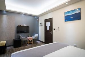 South of Penghu Homestay 객실 침대