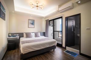 South of Penghu Homestay 객실 침대