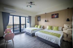 South of Penghu Homestay 객실 침대