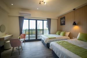 South of Penghu Homestay 객실 침대