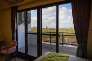 South of Penghu Homestay 객실 침대