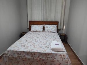 Postel nebo postele na pokoji v ubytování Casa aconchegante