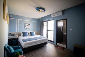 South of Penghu Homestay 객실 침대