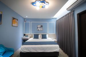 South of Penghu Homestay 객실 침대