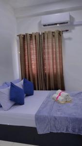Cama o camas de una habitación en KITA IMPIAN B-20-07