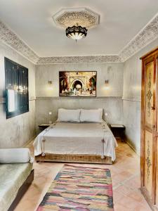 Postel nebo postele na pokoji v ubytování Riad Atlas Toyours