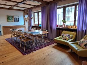 a dining room with a table and chairs at Hotel Union in Offenburg