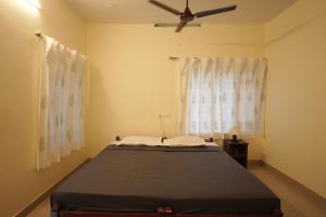 Ein Bett oder Betten in einem Zimmer der Unterkunft Cliff & Coral