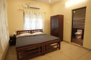 Ein Bett oder Betten in einem Zimmer der Unterkunft Cliff & Coral