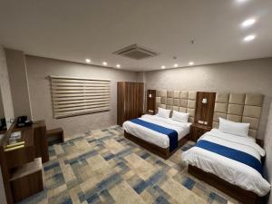 Säng eller sängar i ett rum på Hotel Classy Stay