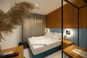 Postelja oz. postelje v sobi nastanitve Aglon Twin's Hotel