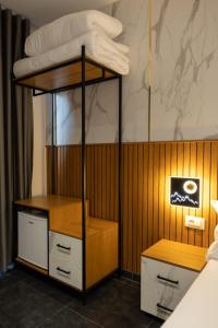Postelja oz. postelje v sobi nastanitve Aglon Twin's Hotel