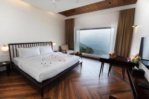 Photo de la galerie de l'établissement Misty Queen By Dimora Hotels, à Kakkadampoyil 26 autres photos