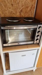 a toaster oven sitting on top of a counter at La joyeuse étape in Sonceboz