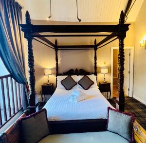 Peak Hotel Castleton客房内的一张或多张床位