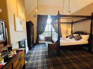 Peak Hotel Castleton客房内的一张或多张床位