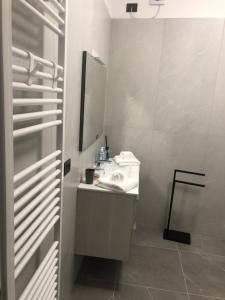 a bathroom with a sink and a mirror at Casa vacanze Savà in Lagaro