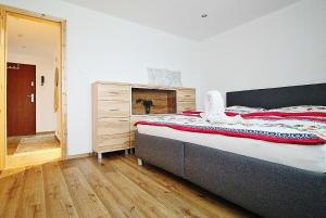 Postel nebo postele na pokoji v ubytování Apartmán 4M Tatry