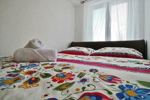 Postel nebo postele na pokoji v ubytování Apartmán 4M Tatry