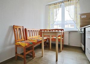 Kuchyň nebo kuchyňský kout v ubytování Apartmán 4M Tatry