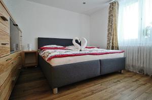Postel nebo postele na pokoji v ubytování Apartmán 4M Tatry