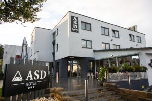 a large white building with aigil hotel on it at ASD Hotel in Filderstadt