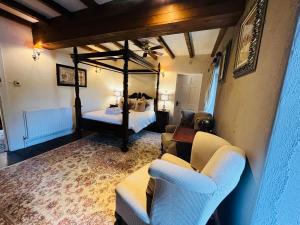 Peak Hotel Castleton客房内的一张或多张床位