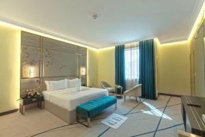 Katil atau katil-katil dalam bilik di Green Park Hotel