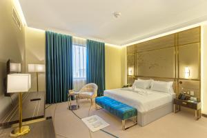 Katil atau katil-katil dalam bilik di Green Park Hotel