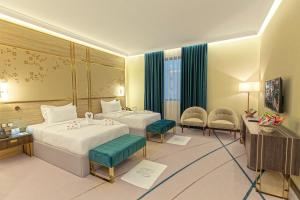 Katil atau katil-katil dalam bilik di Green Park Hotel