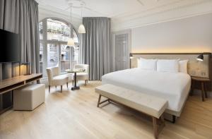 Postelja oz. postelje v sobi nastanitve AC Hotel by Marriott Glasgow