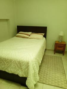 Postel nebo postele na pokoji v ubytování DEPARTAMENTO FAMILIAR Casa Iglesias